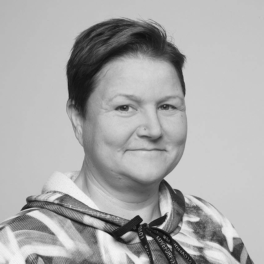 Black and white portrait of a woman with short hair.